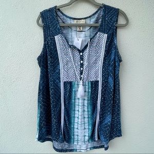 Blue and white sleeveless top